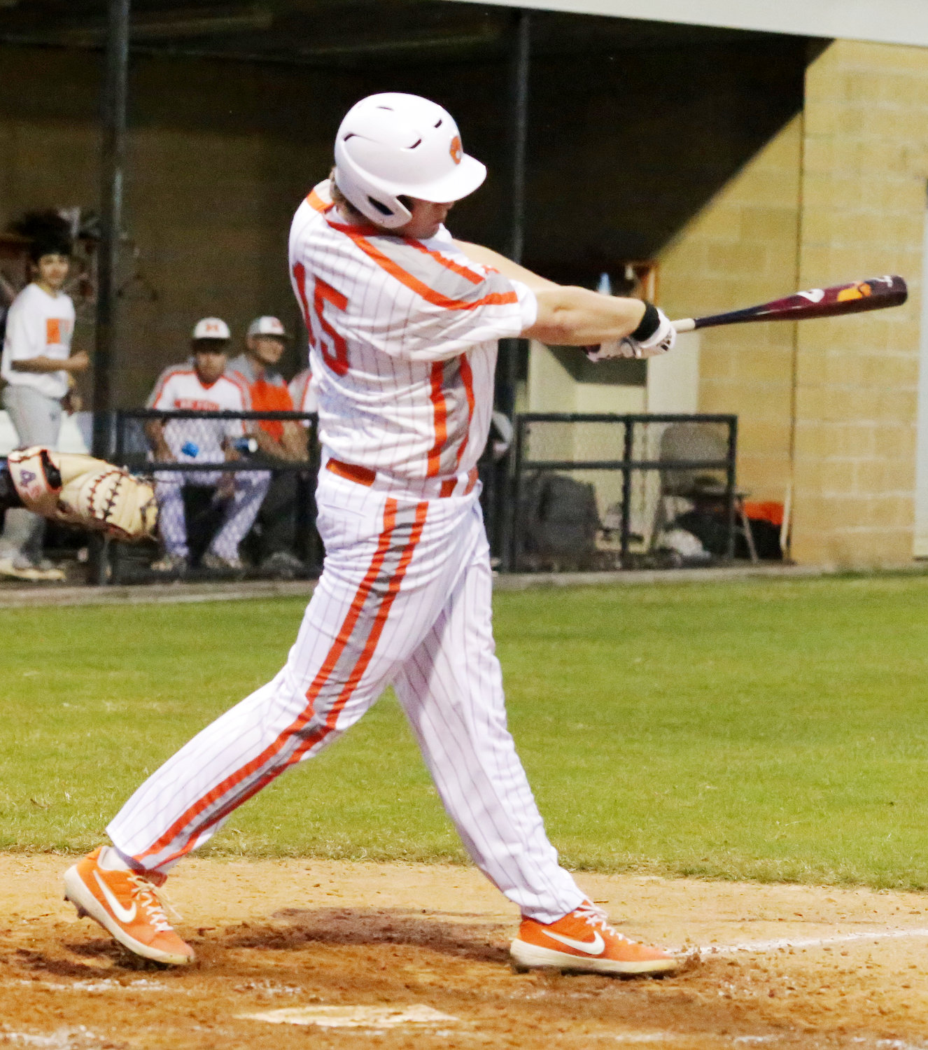 Conner Gibson launches an RBI-double to deep center field in Mineola’s big second-inning rally against Chapel Hill. (Monitor photo by John Arbter)
